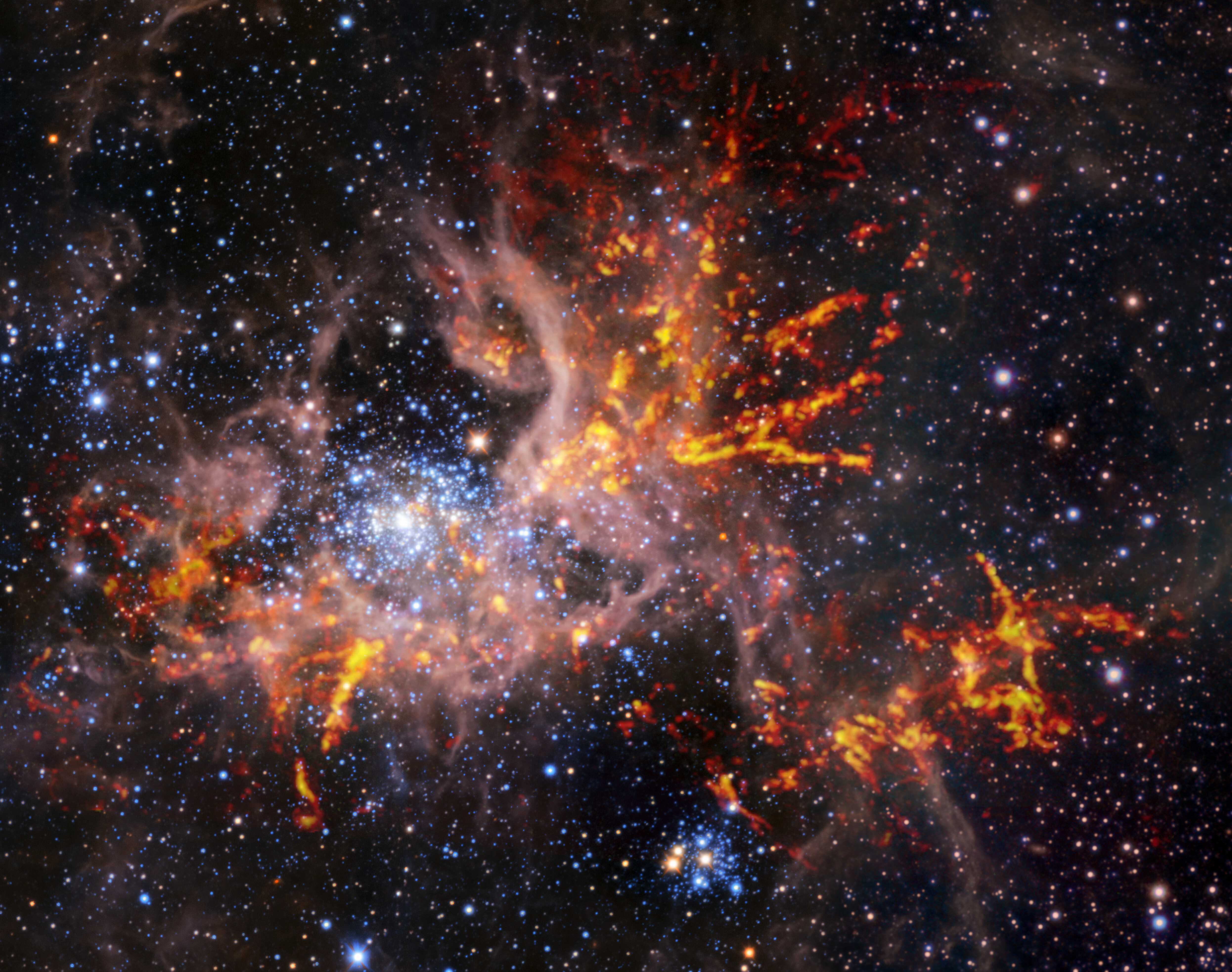 Телескоп ALMA увидел паутину из нитей молекулярного газа в туманности Тарантул
